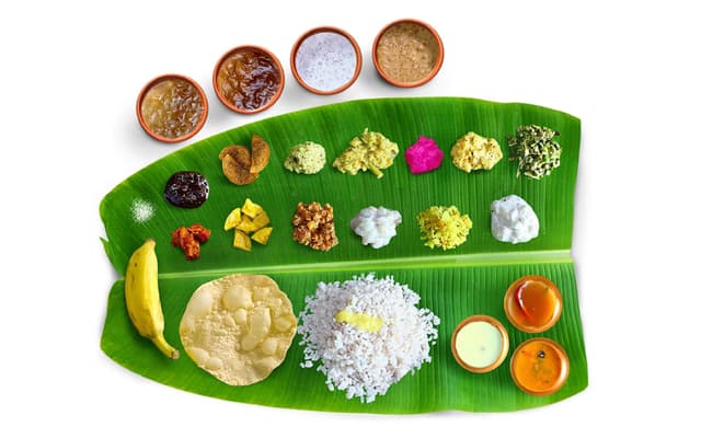 Traditional Kerala Sadhya meal served on a banana leaf